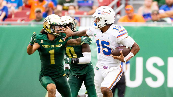 Florida QB Anthony Richardson stiff-arms a defender